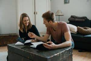 Couple reviewing notes together during a counseling session